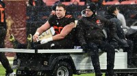 Cleveland Browns center Ethan Pocic (55) is carted off the field during the fourth quarter against the Tennessee Titans at Huntington Bank Field.
