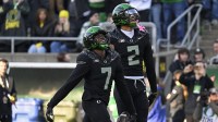 Oregon Ducks wide receiver Evan Stewart (7) celebrates during the game against the Southern California Trojans during the first half at Autzen Stadium.