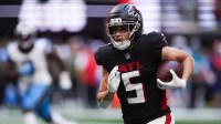 Atlanta Falcons wide receiver Drake London (5) runs the ball in the first quarter against the Carolina Panthers at Mercedes-Benz Stadium