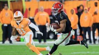 Atlanta Falcons running back Bijan Robinson (7) runs the ball against Tampa Bay Buccaneers safety Antoine Winfield Jr. (31) during the third quarter at Raymond James Stadium.