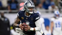 Dallas Cowboys quarterback Dak Prescott (4) rolls out during the first half against the Detroit Lions at Ford Field. Mandatory Credit: Lon Horwedel-Imagn Images