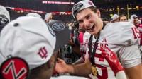 Indiana's Fernando Mendoza (15) celebrates after the Indiana versus Ohio State Big Ten Championship football game at Lucas Oil Stadium on Saturday, Dec. 6, 2025.
