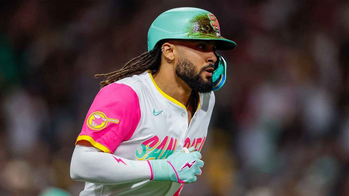 San Diego Padres right fielder Fernando Tatis Jr. (23) hits a grand slam home run during the fourth inning Arizona Diamondbacks at Petco Park.