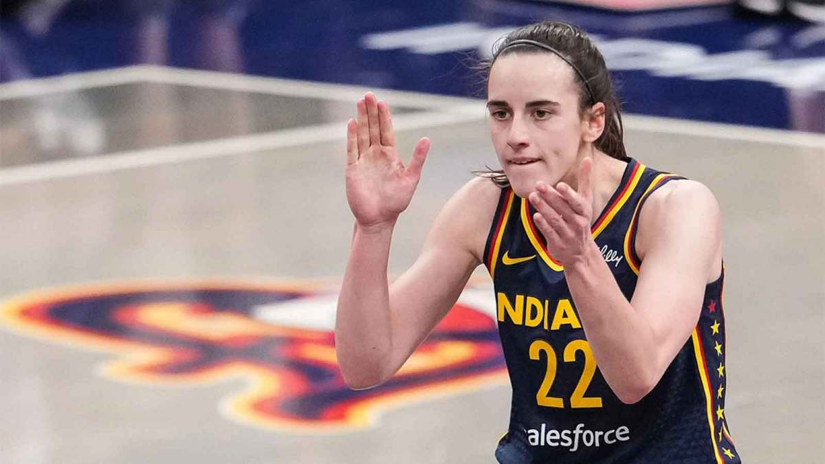 Indiana Fever guard Caitlin Clark (22) claps her hands in excitement Sunday, July 13, 2025, during the game at Gainbridge Fieldhouse