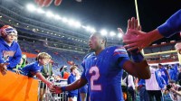 Florida Gators quarterback DJ Lagway (2) leaves the field after a game against the Florida State Seminoles at Ben Hill Griffin Stadium.