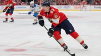 Florida Panthers left wing Brad Marchand (63) moves the puck against the St. Louis Blues during the second period at Amerant Bank Arena. Mandatory Credit: Sam Navarro-Imagn Images