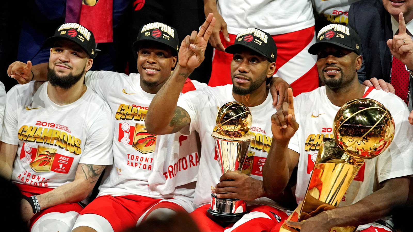 Toronto Raptors guard Fred VanVleet (23), guard Kyle Lowry (7), forward Kawhi Leonard (2) and center Serge Ibaka (9) celebrates after beating the Golden State Warriors in game six of the 2019 NBA Finals at Oracle Arena.