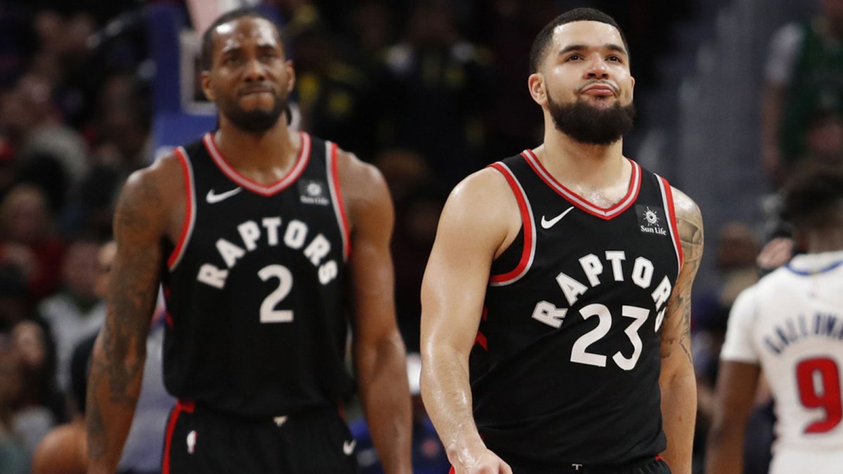 Toronto Raptors guard Fred VanVleet (23) and forward Kawhi Leonard (2) walk to the bench during the fourth quarter against the Detroit Pistons at Little Caesars Arena.