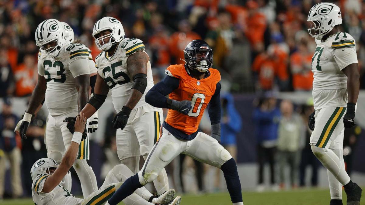 Denver Broncos linebacker Jonathon Cooper (0) reacts after sacking Green Bay Packers quarterback Jordan Love (10) during the fourth quarter at Empower Field at Mile High. Mandatory Credit: Isaiah J. Downing-Imagn Images