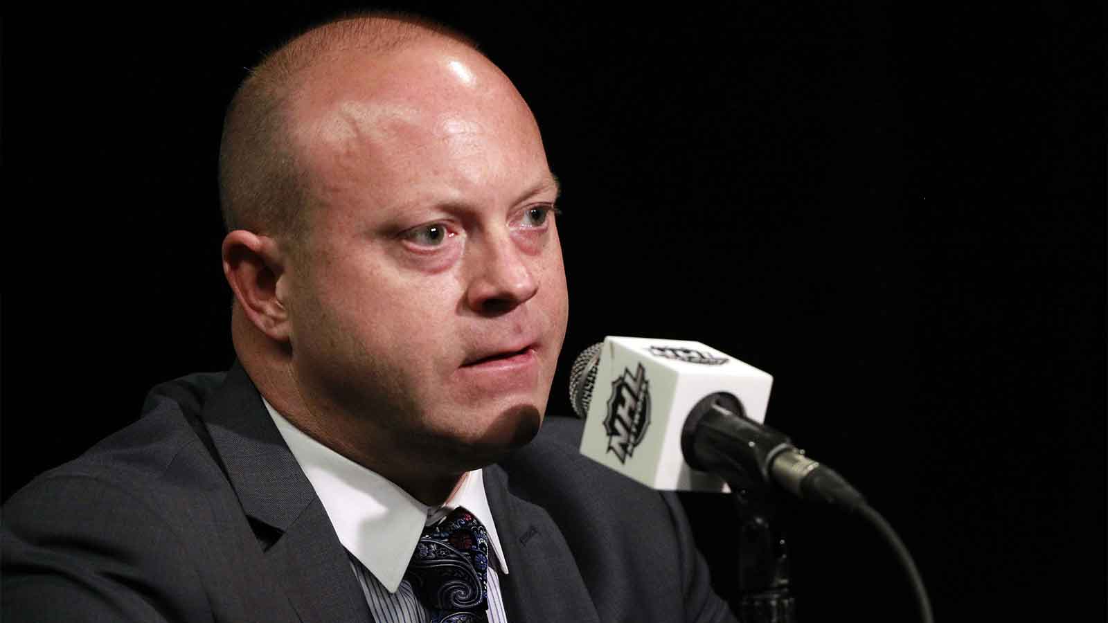 Chicago Blackhawks general manager Stan Bowman talks with media during media day the day before the 2015 Stanley Cup Final at Amalie Arena. 