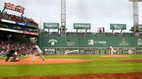 Boston Red Sox starting pitcher Garrett Crochet (35) pitches to New York Mets right fielder Juan Soto (22) during the first inning at Fenway Park.