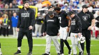 Las Vegas Raiders quarterback Geno Smith (7) is helped off the field in the fourth quarter against the New York Giants at Allegiant Stadium. Mandatory Credit: Stephen R. Sylvanie-Imagn Images
