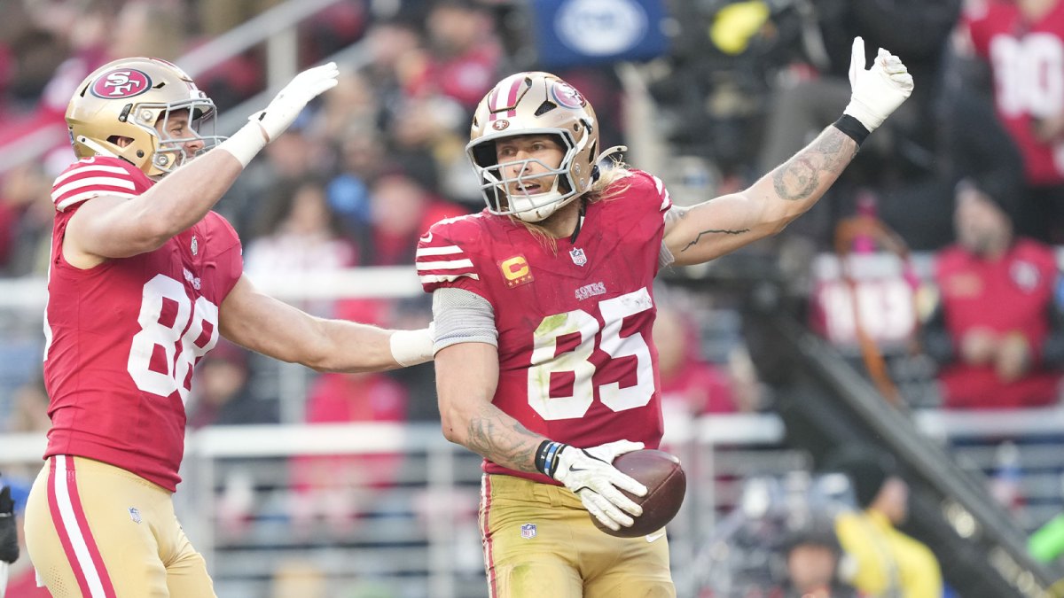 San Francisco 49ers tight end George Kittle (85) celebrates scoring a touchdown during the third quarter against the Tennessee Titans at Levi's Stadium.