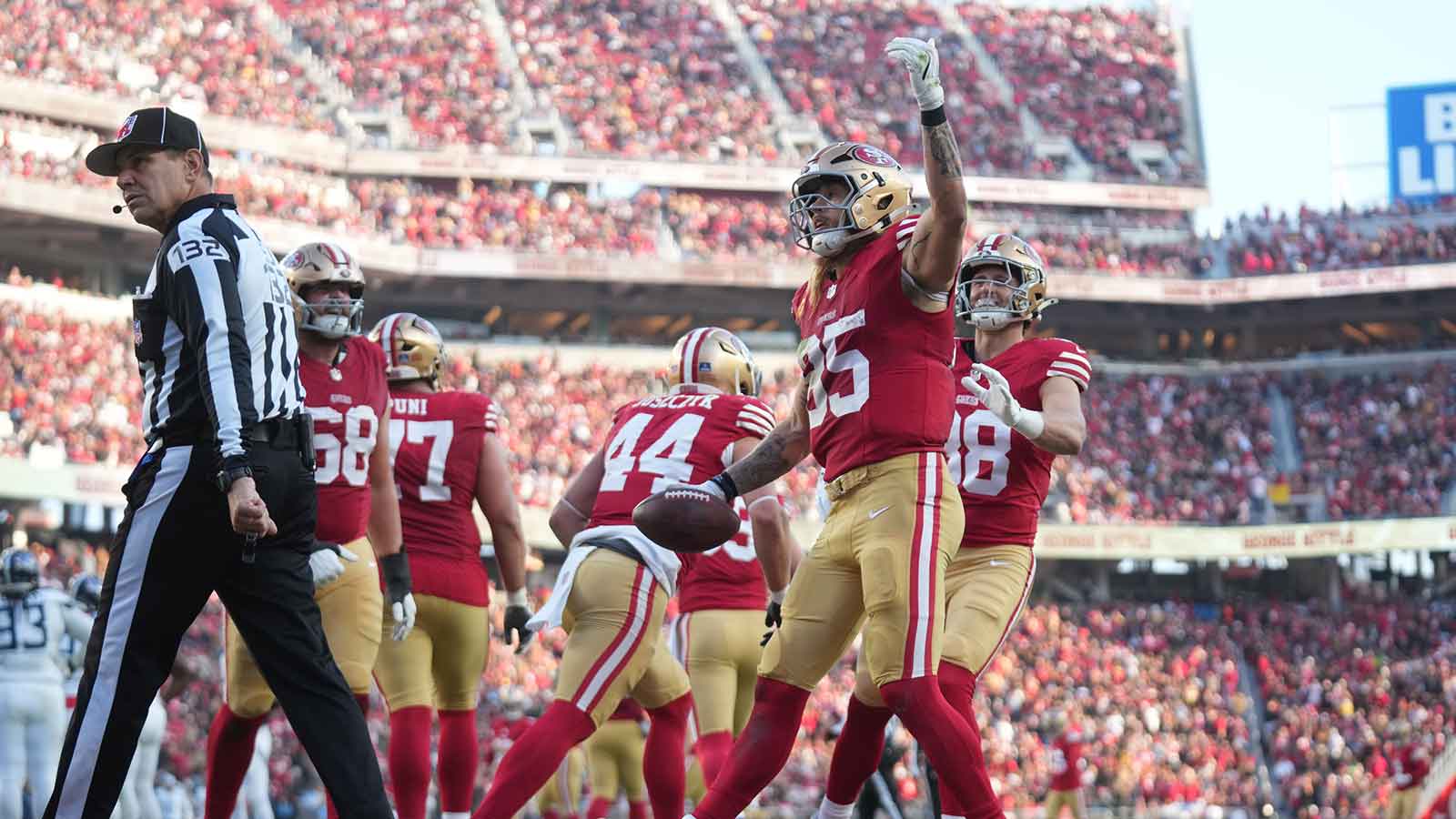 San Francisco 49ers tight end George Kittle (85) scores a touchdown during the third quarter against the Tennessee Titans at Levi's Stadium.
