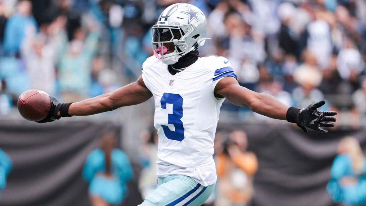 Dallas Cowboys wide receiver George Pickens (3) celebrates a touchdown during the second half against the Carolina Panthers at Bank of America Stadium.