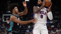 Philadelphia 76ers forward Paul George (8) handles the ball as Memphis Grizzlies forward Jaylen Wells (0) defends during the second quarter at FedExForum.