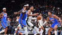 Milwaukee Bucks forward Giannis Antetokounmpo (34) drives the ball towards the basket against the Oklahoma City Thunder during the first half at Fiserv Forum.