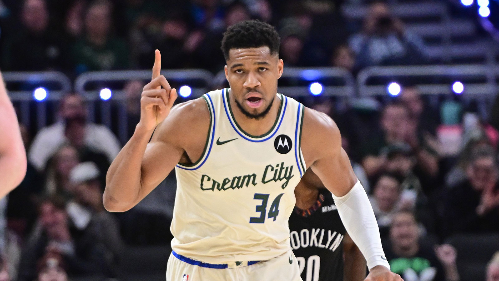 Milwaukee Bucks forward Giannis Antetokounmpo (34) reacts after scoring his 21,000th career point in the third quarter against the Brooklyn Nets at Fiserv Forum. 