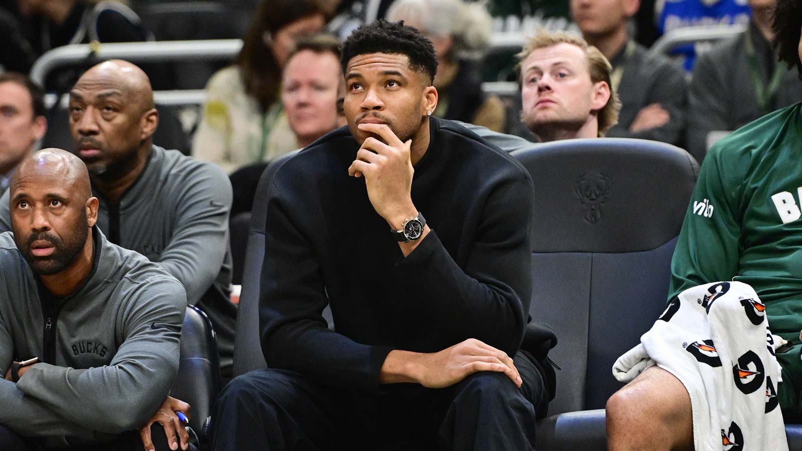 Milwaukee Bucks forward Giannis Antetokounmpo (34) looks on from the bench while recovering from an injury in the second quarter against the Boston Celtics at Fiserv Forum.