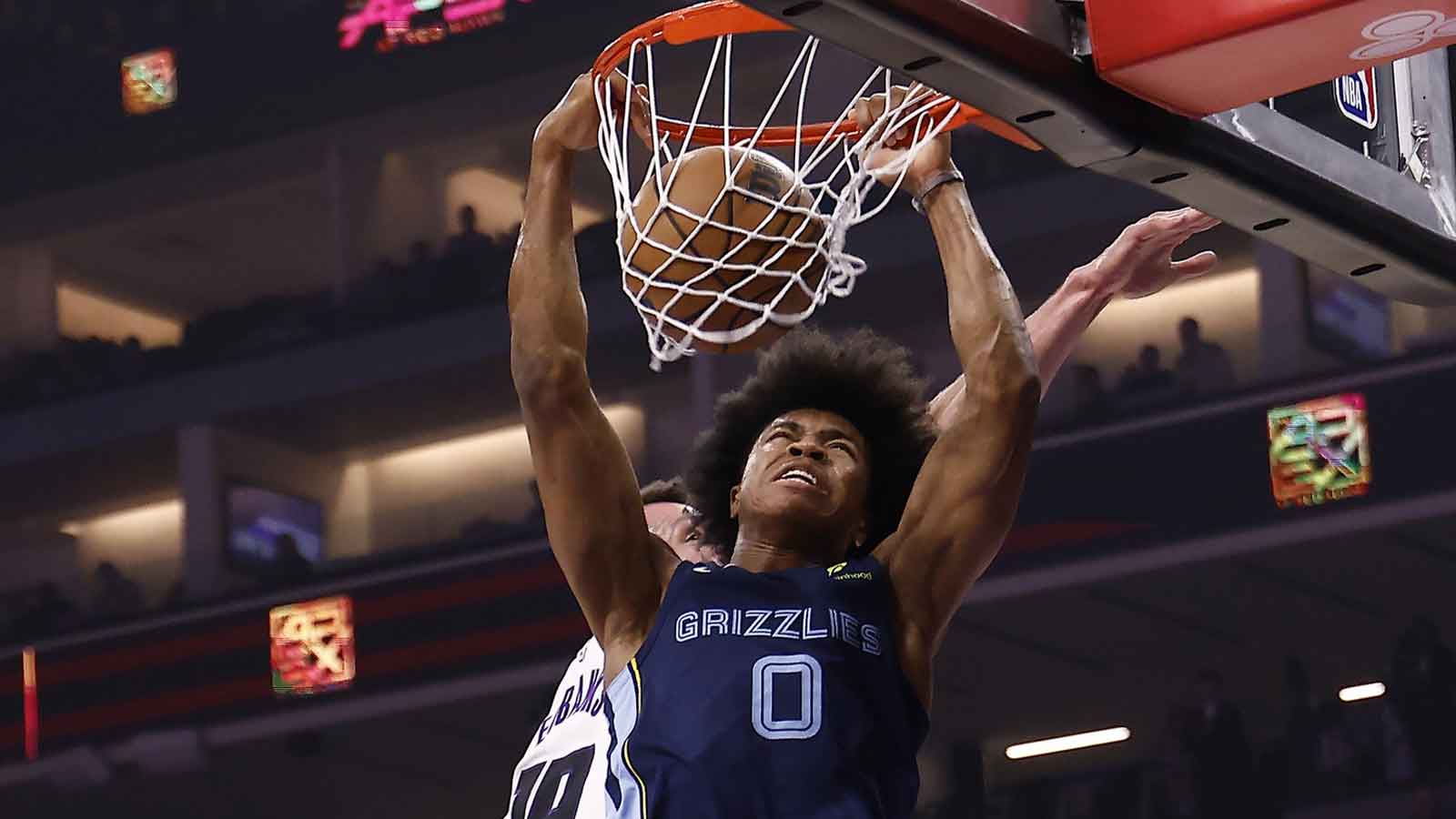 Memphis Grizzlies forward Jaylen Wells (0) dunks the ball against Sacramento Kings forward/center Drew Eubanks (19) during the first quarter at Golden 1 Center.