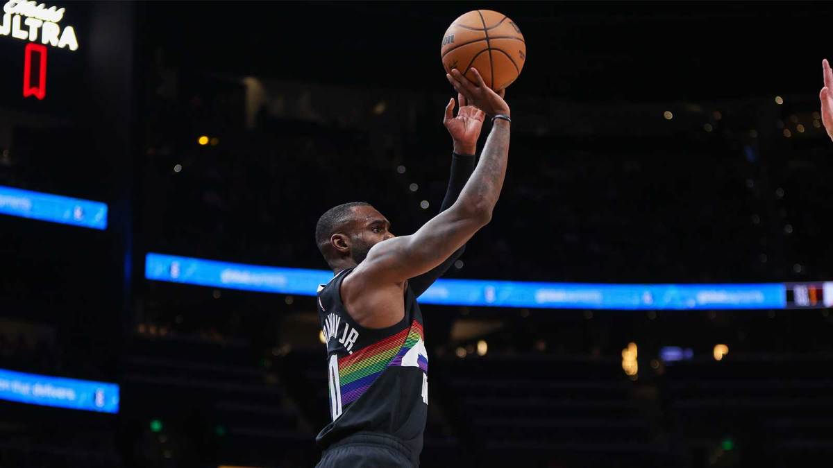 Denver Nuggets guard Tim Hardaway Jr. (10) shoots against the Atlanta Hawks in the third quarter at State Farm Arena.
