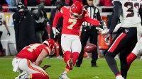 Kansas City Chiefs place kicker Harrison Butker (7) makes a field goal from the hold of Kansas City Chiefs punter Matt Araiza (14) during the third quarter against the Houston Texans at GEHA Field at Arrowhead Stadium.