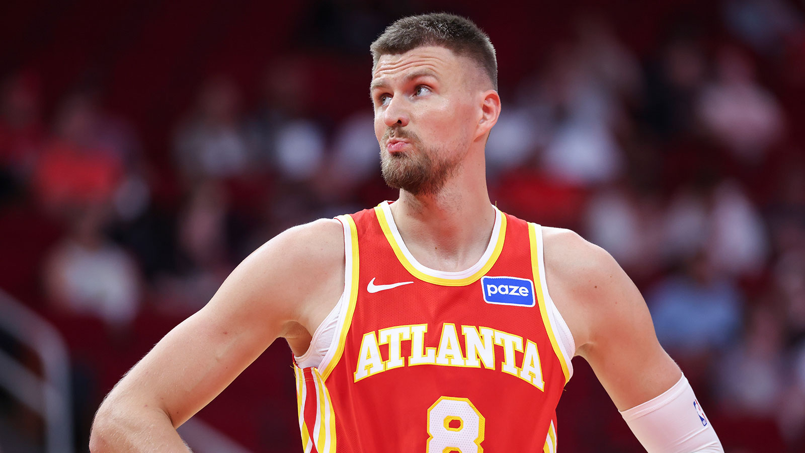 Atlanta Hawks forward/center Kristaps Porzingis (8) reacts during the second quarter against the Houston Rockets at Toyota Center.