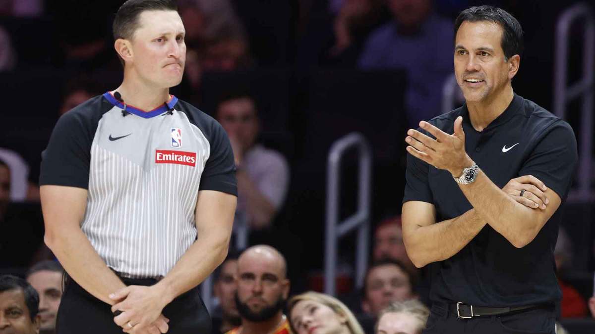 Heat head coach Erik Spoelstra argues a call