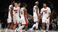 Heat's Norman Powell and the starters head to the bench