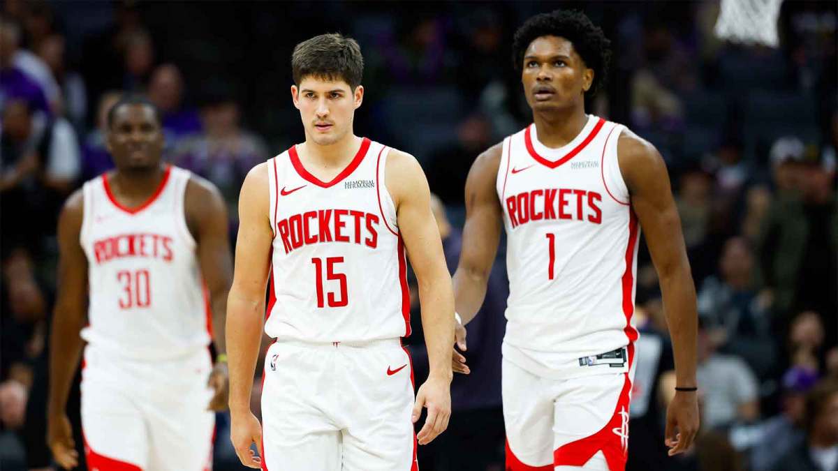Houston Rockets guard Reed Sheppard (15) and guard Amen Thompson (1) walk off the court for a time out during the fourth quarter against the Sacramento Kings at Golden 1 Center.