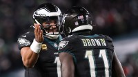 Philadelphia Eagles quarterback Jalen Hurts (1) and wide receiver A.J. Brown (11) celebrate a touchdown against the Chicago Bears during the third quarter of the game at Lincoln Financial Field.
