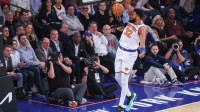 New York Knicks center Karl-Anthony Towns (32) dunks in the first quarter against the Charlotte Hornets at Madison Square Garden.