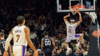 Los Angeles Lakers center Jaxson Hayes (11) reacts after a slam dunk in the first half during a game against the Phoenix Suns at Mortgage Matchup Center.