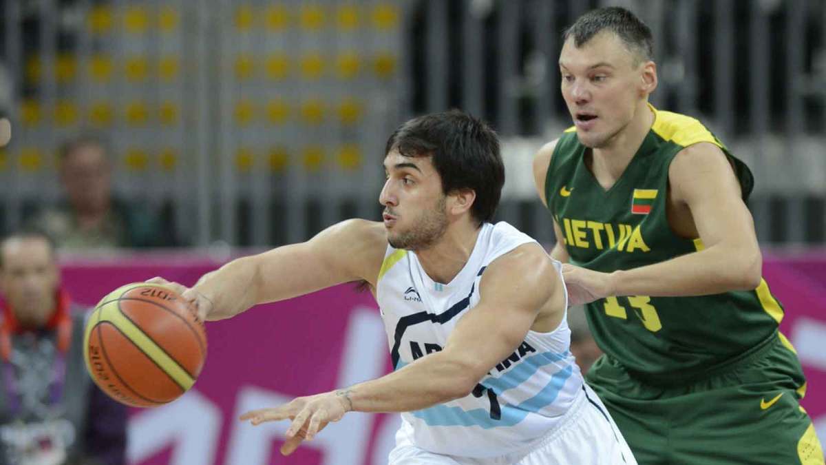Argentina guard Facundo Campazzo (7) looks to pass the ball as Lithuania guard Sarunas Jasikevicius (13) defends at Basketball Center.