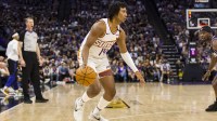 Phoenix Suns guard TyTy Washington Jr. (14) dribbles against the Sacramento Kings during the fourth quarter at Golden 1 Center.