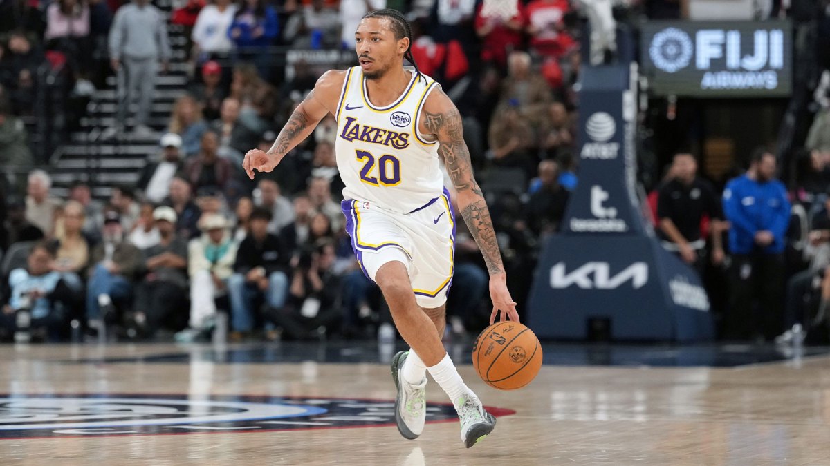 Los Angeles Lakers guard Nick Smith Jr. (20) dribbles the ball against the LA Clippers in the second half at Intuit Dome.