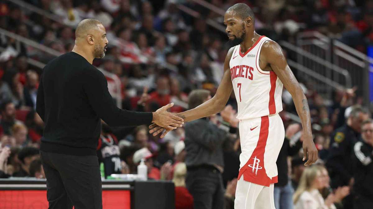 Houston Rockets forward Kevin Durant (7) shakes hands with head coach Ime Udoka during the third quarter against the Phoenix Suns at Toyota Center.