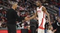 Houston Rockets forward Kevin Durant (7) shakes hands with head coach Ime Udoka during the third quarter against the Phoenix Suns at Toyota Center.