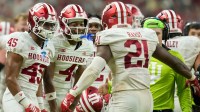 Indiana Hoosiers celebrate a missed field goal by the Ohio State Buckeyes Sunday, Dec. 7, 2025, during the Big Ten football championship at Lucas Oil Stadium in Indianapolis.