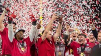 Indiana Head Coach Curt Cignetti and the Hoosiers celebrate after the Indiana versus Ohio State Big Ten Championship football game at Lucas Oil Stadium on Saturday, Dec. 6, 2025.
