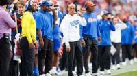 Florida Gators interim head coach Billy Gonzales looks on against the Florida State Seminoles during the first half at Ben Hill Griffin Stadium.