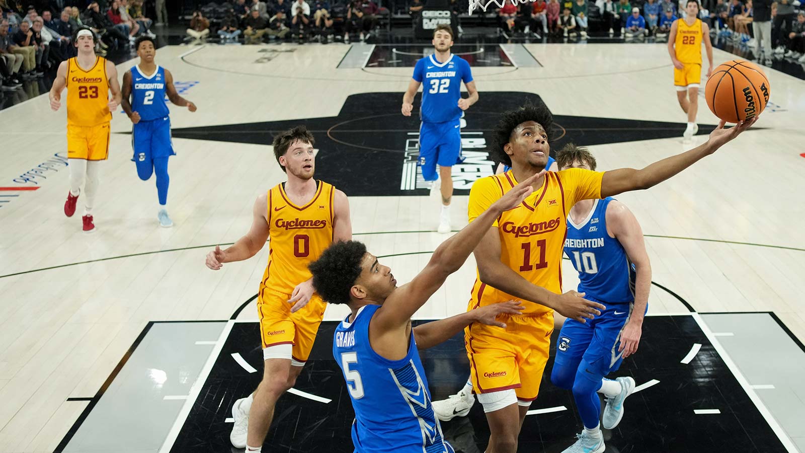 Iowa State Cyclones guard Dominick Nelson (11) shoots the ball defended by Creighton Bluejays guard Nik Graves (5) during the second half in a 2025 Players Era Festival group play game at Michelob Ultra Arena. 