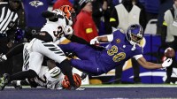 Baltimore Ravens tight end Isaiah Likely (80) attempts to make a catch against the Cincinnati Bengals during the first half at M&T Bank Stadium. Mandatory Credit: Tommy Gilligan-Imagn Images