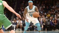 Hornets guard Isaiah Thomas (4) looks to drive in during the first half against the Boston Celtics at the Spectrum Center