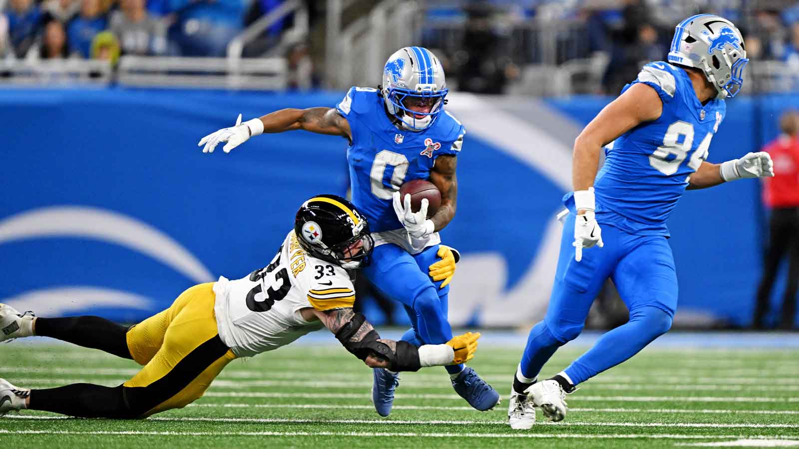 Detroit Lions running back Jahmyr Gibbs (0) runs the ball during the first quarter against the Pittsburgh Steelers at Ford Field.