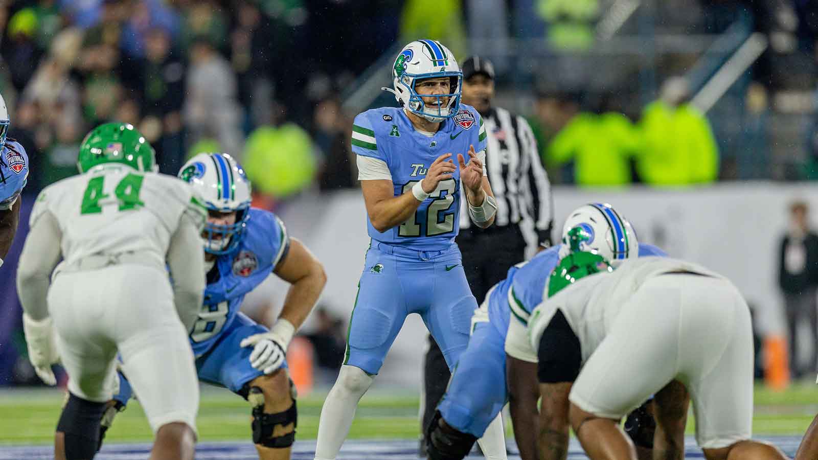 Tulane Green Wave quarterback Jake Retzlaff (12) calls for the ball against the North Texas Mean Green during the first half in the 2025 American Championship at Yulman Stadium.