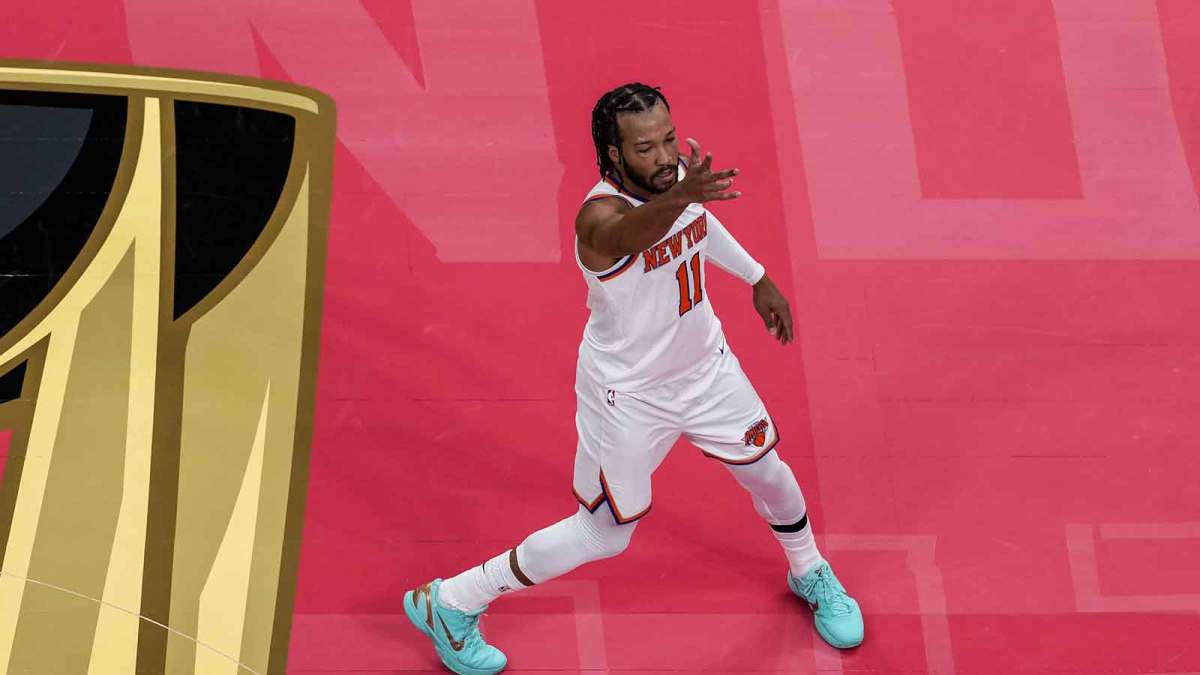 New York Knicks guard Jalen Brunson (11) reacts after scoring against the Toronto Raptors during the first half at the 2025-26 NBA Emirates Cup at Scotiabank Arena.