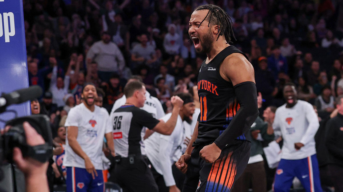 New York Knicks guard Jalen Brunson (11) reacts after making a basket during the second half against the Milwaukee Bucks at Madison Square Garden.