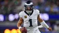 Philadelphia Eagles quarterback Jalen Hurts (1) looks to pass against the Los Angeles Chargers in the first half at SoFi Stadium.