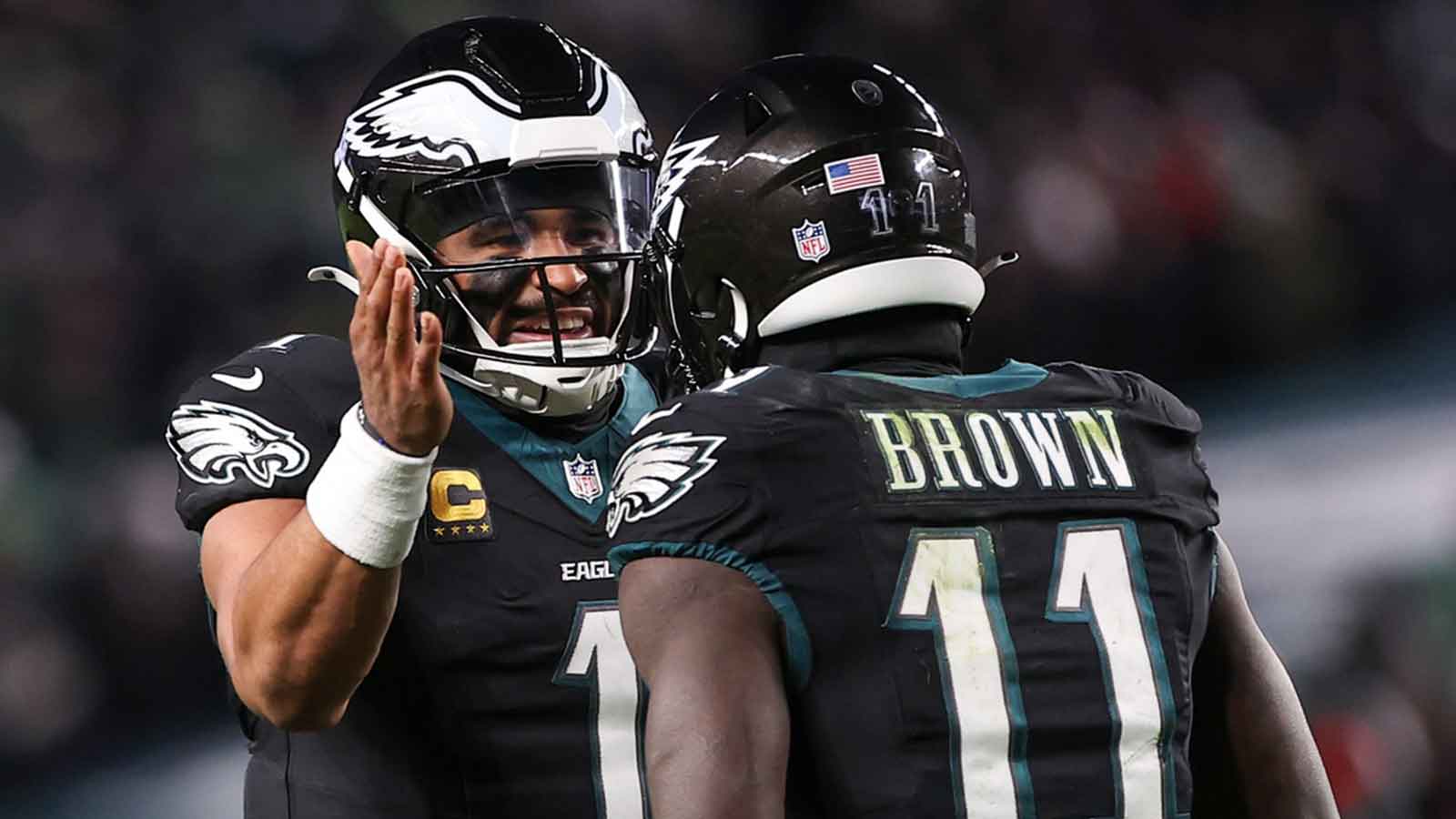 Philadelphia Eagles quarterback Jalen Hurts (1) and wide receiver A.J. Brown (11) celebrate a touchdown against the Chicago Bears during the third quarter of the game at Lincoln Financial Field.